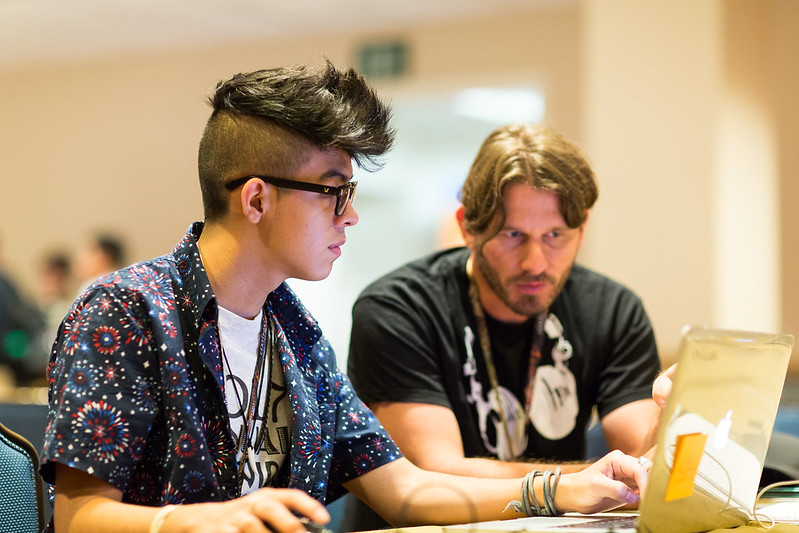 Student and Teacher Building Resume